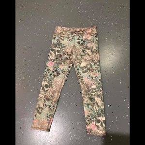 Evolution and Creation skull workout capris